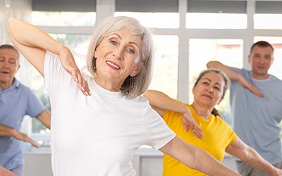 Seniors participating in Zumba class links to the Senior Active Adult Programs webpafe